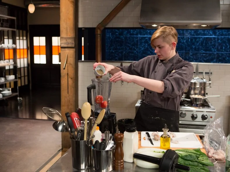 Teen competitor Lucy Felong (15) works on her entree that must include: frogs legs, mafaldine, bok choy and lobster mushrooms, as seen on Food Network's Chopped, Season 21.