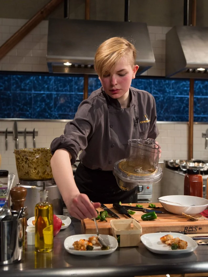 Teen competitor Lucy Felong (15) working on her appetizer that must include: jumbo shrimp, chunky peanut butter, jalapeno and sticky rice, as seen on Food Network's Chopped, Season 21.