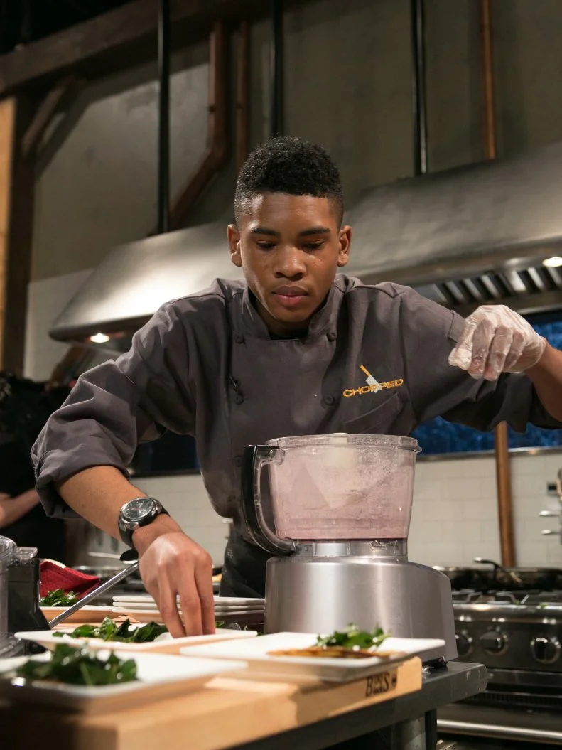 Teen Competitor Brandon Medley (15) works on his appetizer that must include: rabbit and ginger sausage, dandelion greens, dried currants and hot sauce candy canes as he competes for a slot in the Teen Challenge and a chance to win $25,000 and a $40,000 culinary school scholarship, as seen on Food Network's Chopped, season 21.