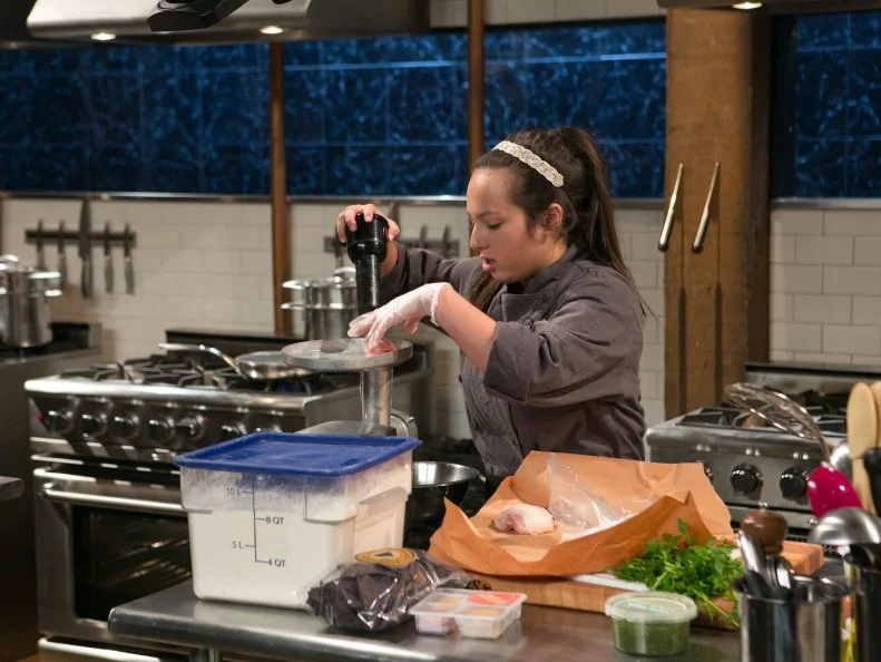 Teen competitor Morgan Goldstein (14)working on her appetizer that must include: salsa verde, chicken breast, bundled lunch kits and blue corn tortilla chips as she competes for a slot in the Teen Challenge and a chance to win $25,000 and a $40,000 culinary school scholarship, as seen on Food Network's Chopped, season 21.