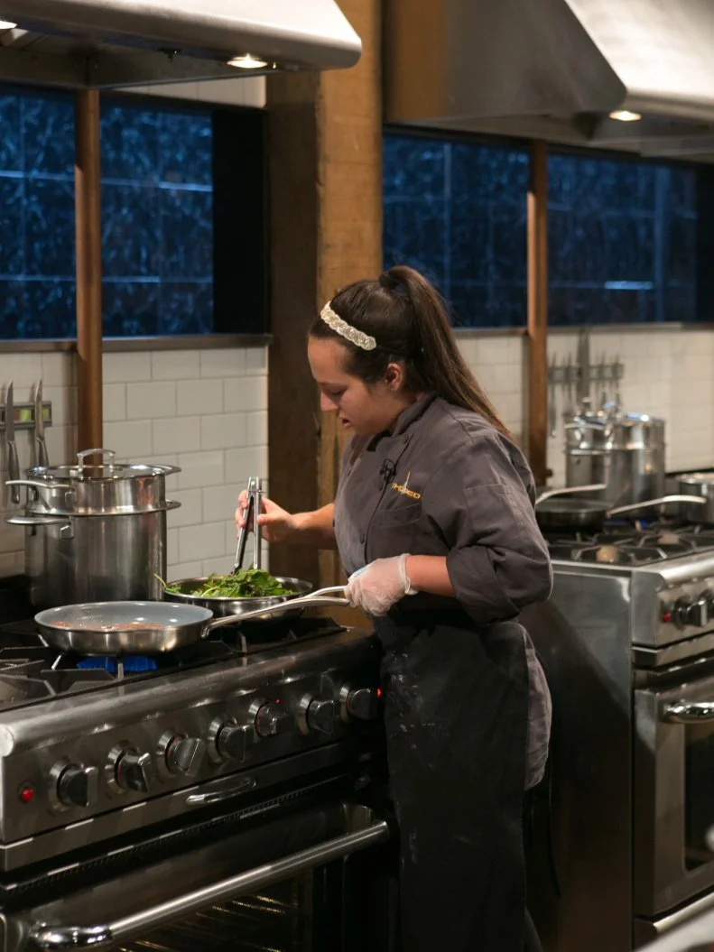 Teen competitor Morgan Goldstein (14) working on her entree that must include: buffalo tenderloin, cous cous, swiss chard and squeezable blueberry yogurt, as she competes for a slot in the Teen Challenge and a chance to win $25,000 and a $40,000 culinary school scholarship, as seen on Food Network's Chopped, season 21.