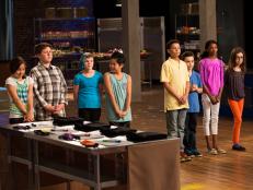 Hosts Rachael Ray and Guy Fieri explain the Taste, Touch, Smell Challenge to the contestants as seen on Food Network's Rachael vs. Guy: Kids Cook-Off, Season 2