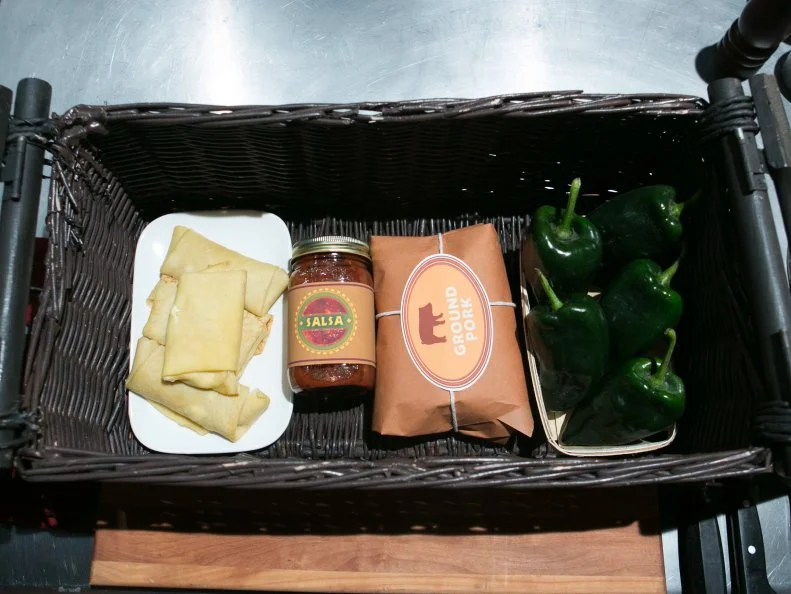 The appetizer round mystery basket ingredients are: cheese blintzes, salsa, ground pork and poblano peppers, as seen on Food Network's Chopped, Season 21.