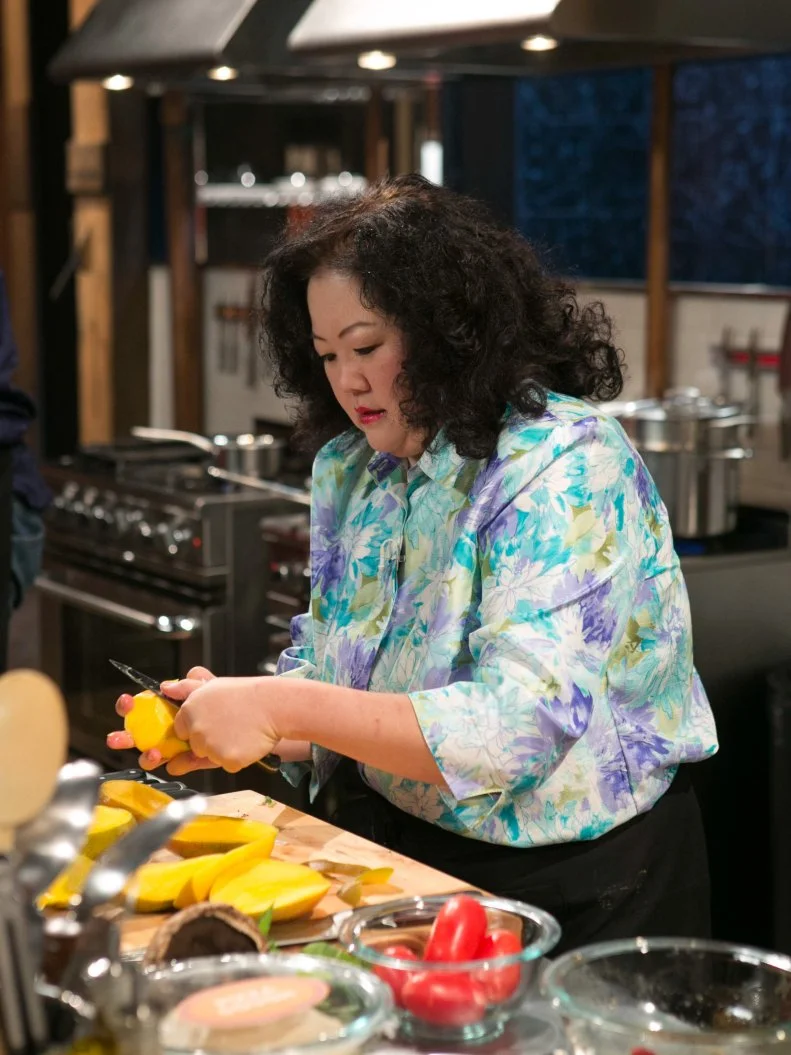 Amateur chef Dinah Suhr works on her entree that must include:Wagyu ribeye steaks, jalapeno chips, pink pearl sedum and mango as she competes for a slot in the Chopped Ultimate Championship competition, the winner of which receives $50,000 and a new car from Buick, as seen on Food Network's Chopped, Season 21.