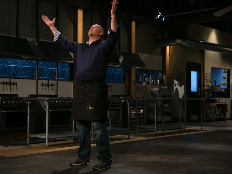 Amateur chef Keith Young reacts to winning a slot in the Chopped Ultimate Championship competition, the winner of which receives $50,000 and a new car from Buick, as seen on Food Network's Chopped, Season 21.