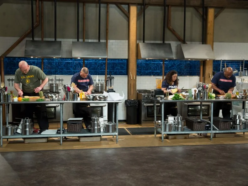 Hero Champions Robbie Myers, Paul Rut, Diana Sabater, and Richard Fields complete in the Chopped kitchen, as seen on Food Networkâ  s Chopped, Season 21.