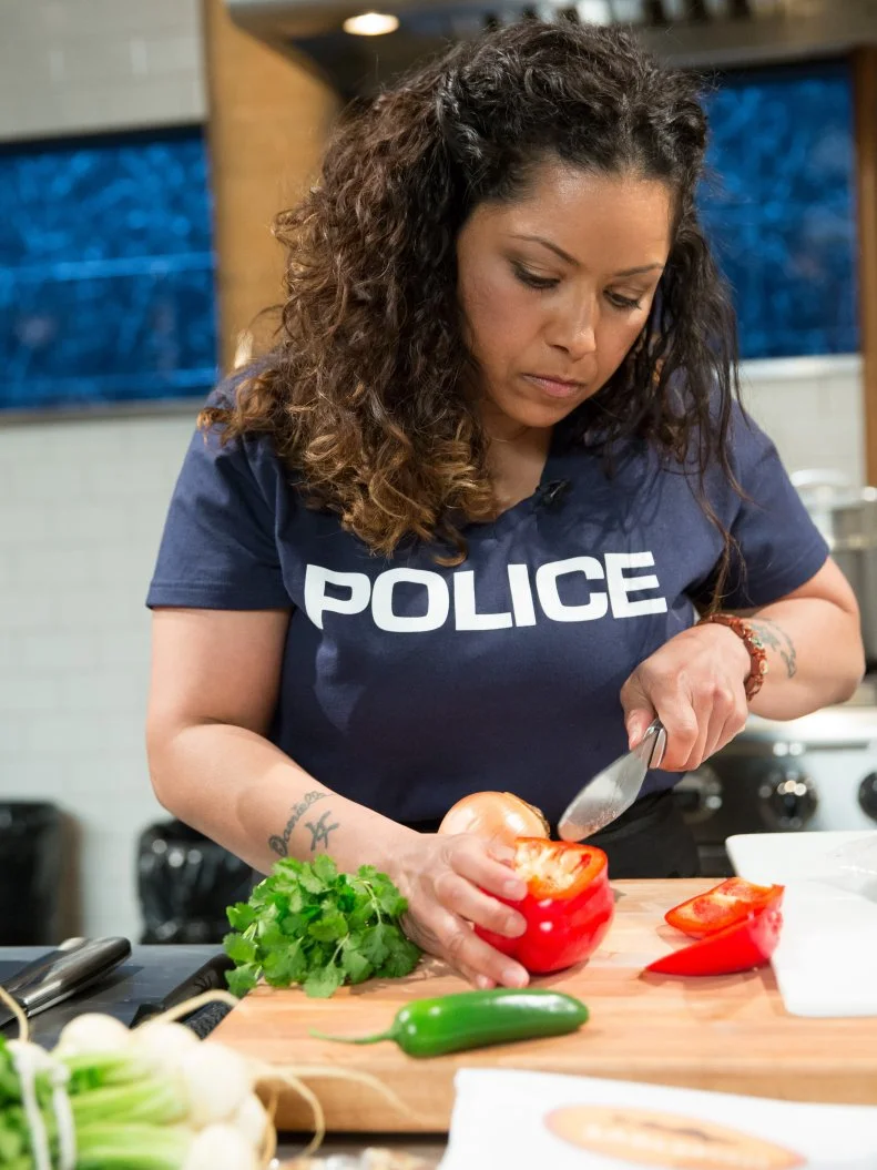 Former Police Officer, Chef Diana Sabater cooks in the Chopped kitchen, as seen on Food Networkâ  s Chopped, Season 21.