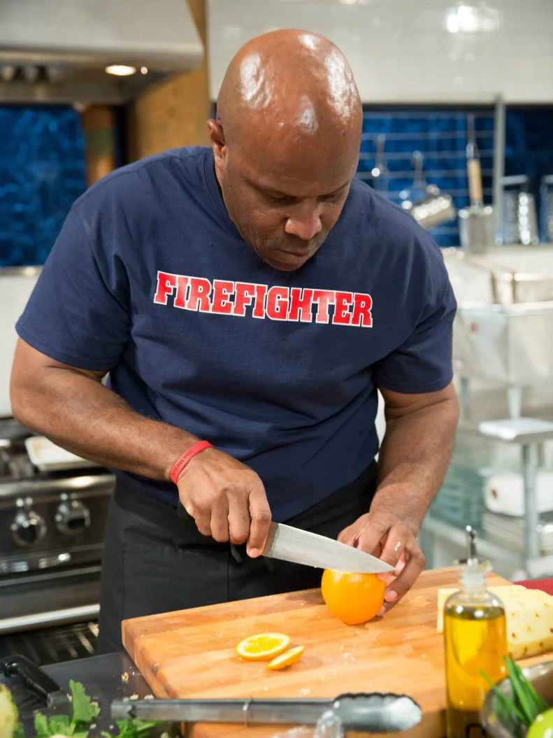 Firefighter, Chef Richard Fields cooks in the Chopped kitchen, as seen on Food Networkâ  s Chopped, Season 21.
