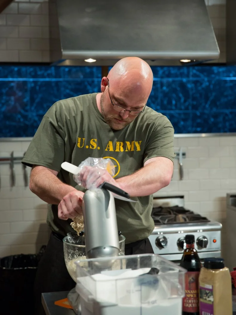 Former Army soldier, Chef Robbie Myers completing in the Chopped kitchen, as seen on Food Networkâ  s Chopped, Season 21.
