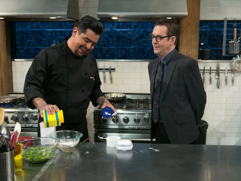 Chopped After Hours host Ted Allen checks in on chef Aaron Sanchez as he works on his dish that must include: whole suckling pig, kebab sauces, fiddlehead ferns and fresh corn tortillas, as seen on Food Network's Chopped After Hours, Season 21.