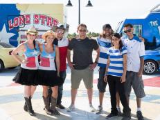 Host Tyler Florence poses with Team Lone Star Chuck Wagon's Lance Kramer, Rachel Young and Andrea Chesley and Team Middle Feast's Arkadi Kluger, Hilla Marudi and Tommy Marudi in the finale location, Key West, as seen on Food Network's The Great Food Truck Race, Season 5.