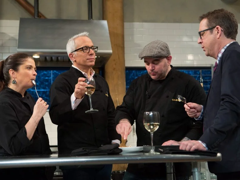 The Chopped After Hours host Ted Allen with chefs: Alex Guarnaschelli, Geoffrey Zakarian and Chis Santos tasting the dishes they made with ingredients from the "short order" episode: banana pudding, vanilla ice cream, icing, brownie mix, as seen on Food Network's Chopped After Hours, Season 21.