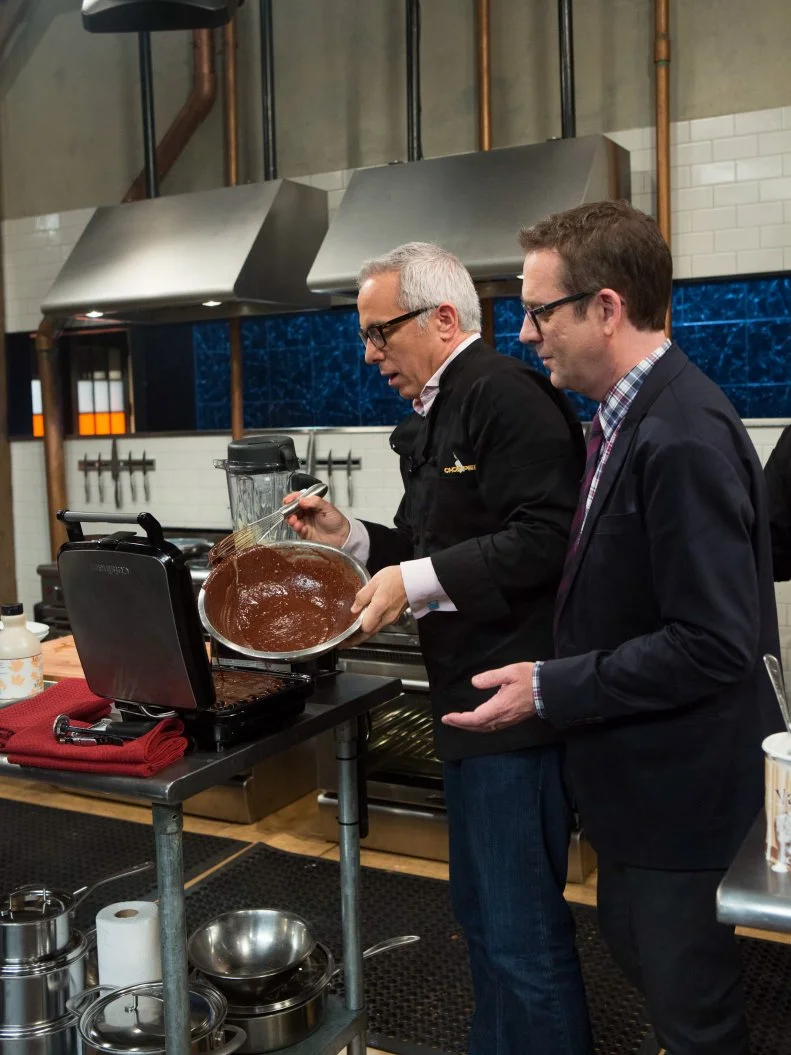The Chopped After Hours host Ted Allen checks in on chef Geoffrey Zakarian as he works with the ingredients from the "short order" episode: banana pudding, vanilla ice cream, icing, brownie mix, as seen on Food Network's Chopped After Hours, Season 21.