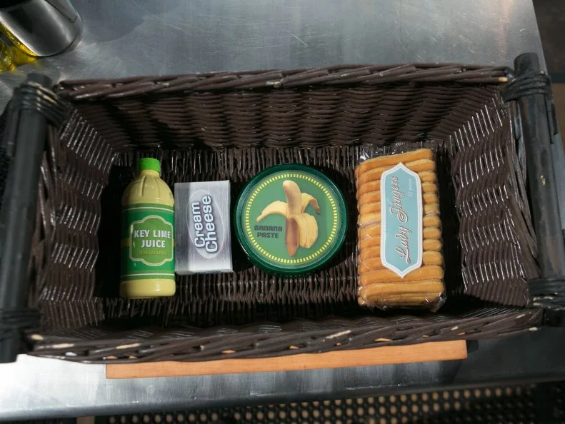 The dessert round mystery ingredients are: key lime juice, cream cheese, banana paste and lady fingers, as seen on Food Network's Chopped, Season 21.