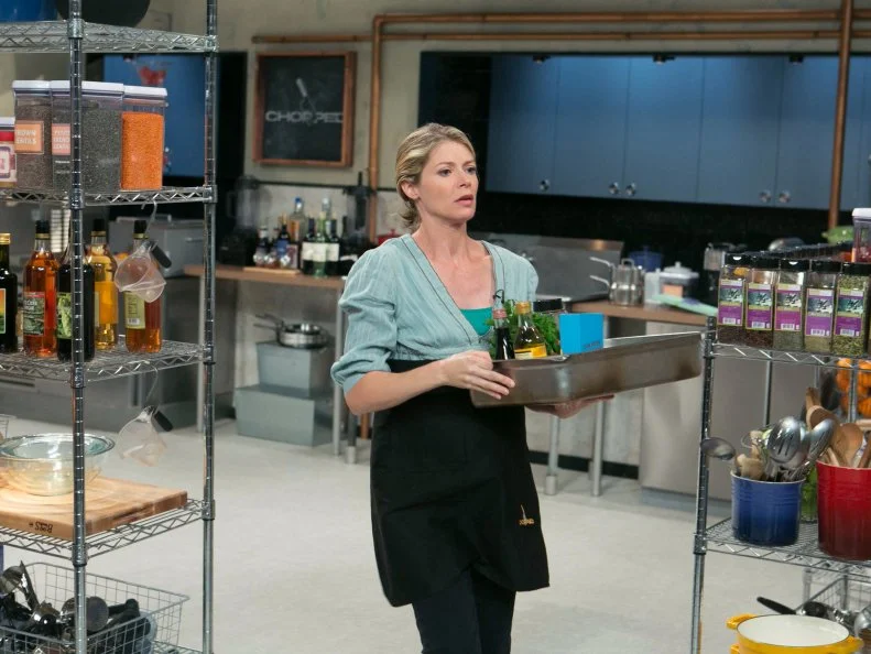 Gillian Vigman works on her appetizer that must contain: salmon fillets, avocados, sweet tea and cricket flour as she competes for a slot in the Chopped Ultimate Championship competition, the winner of which receives $50,000 and a new car from Buick, as seen on Food Network's Chopped, Season 21.