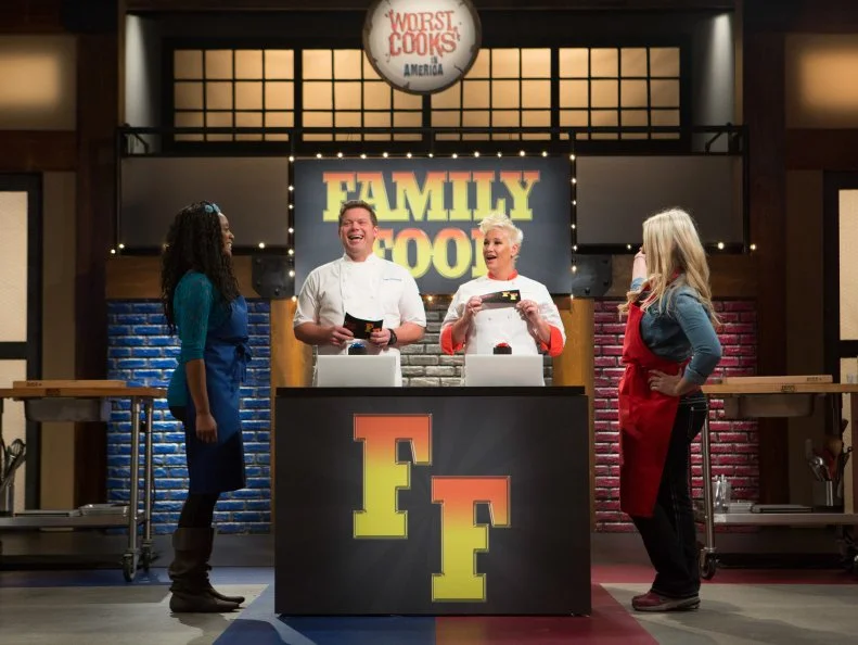 Kortni Montgomery of Chef Tyler's blue team faces off against Kristen Redmond of Chef Anne's Red Team in a game of Family Food, for each correct answer the winning team will receive instruction on another step of their next recipe, as seen on Food Network's Worst Cooks in America, Season 6.