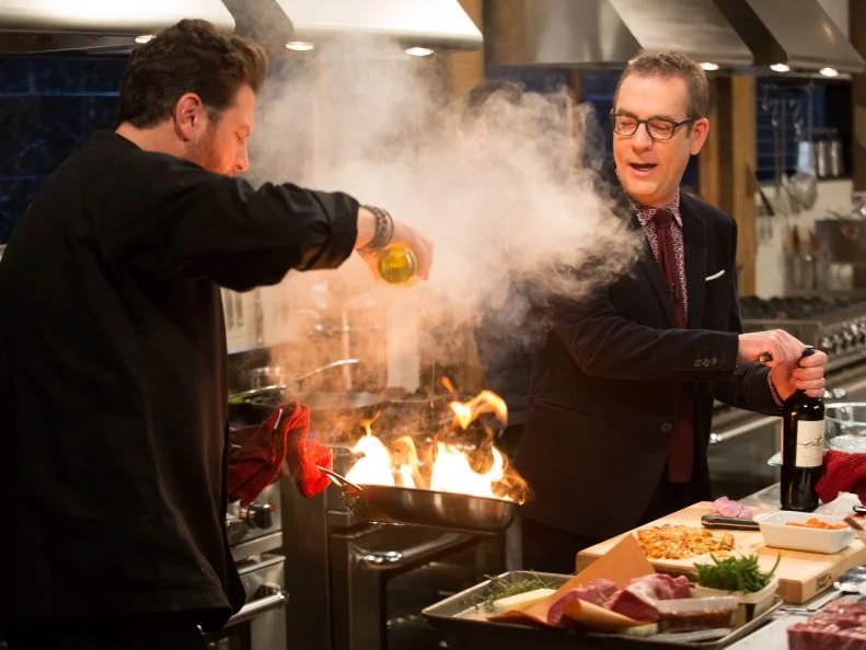 Chopped host Ted Allen checks in on chef Scott Conant as he works on his entree that must use the ingredients beef tenderloin, ginger snap cocktail, potato latkes and Tsimis, as seen on Food Network's Chopped After Hours, Season 24.