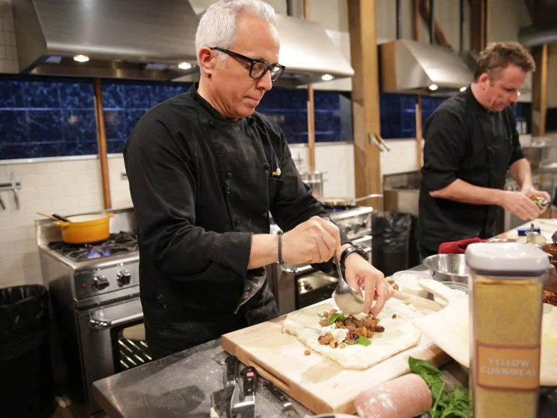 Geoffrey Zakarian, using pork roll, baby eggplant, pizza dough and Chinese spaghetti sauce, during a family affair theme webisode, as seen on Food Network’s Chopped After Hours, Season 26.