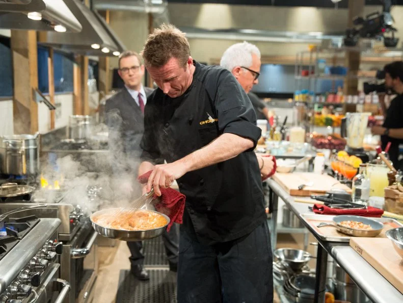 Marc Murphy cooking with lemonade, ball park peanuts, marshmallow-cereal treats and peaches, during a veteran theme webisode, as seen on Food Network’s Chopped After Hours, Season 26.
