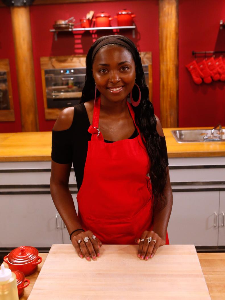 Red team recruit Chanda Havard poses on the set of Food Network's Worst Cooks in America, Season 8.