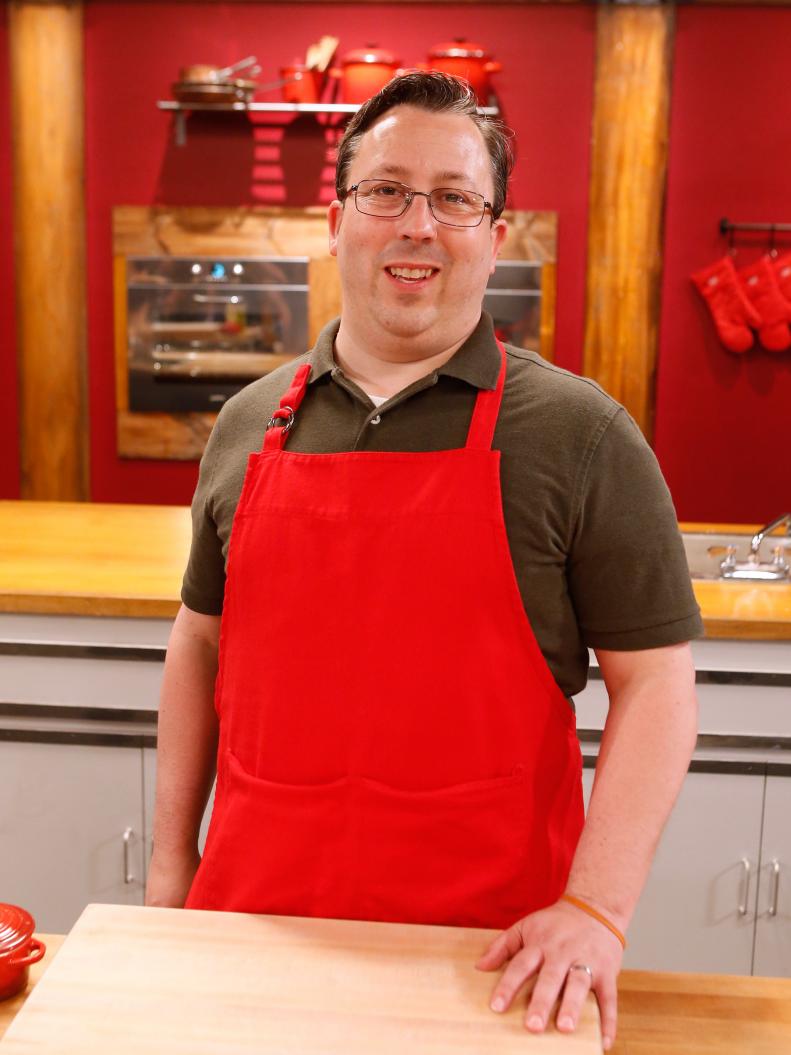 Red team recruit David Foust poses on the set of Food Network's Worst Cooks in America, Season 8.