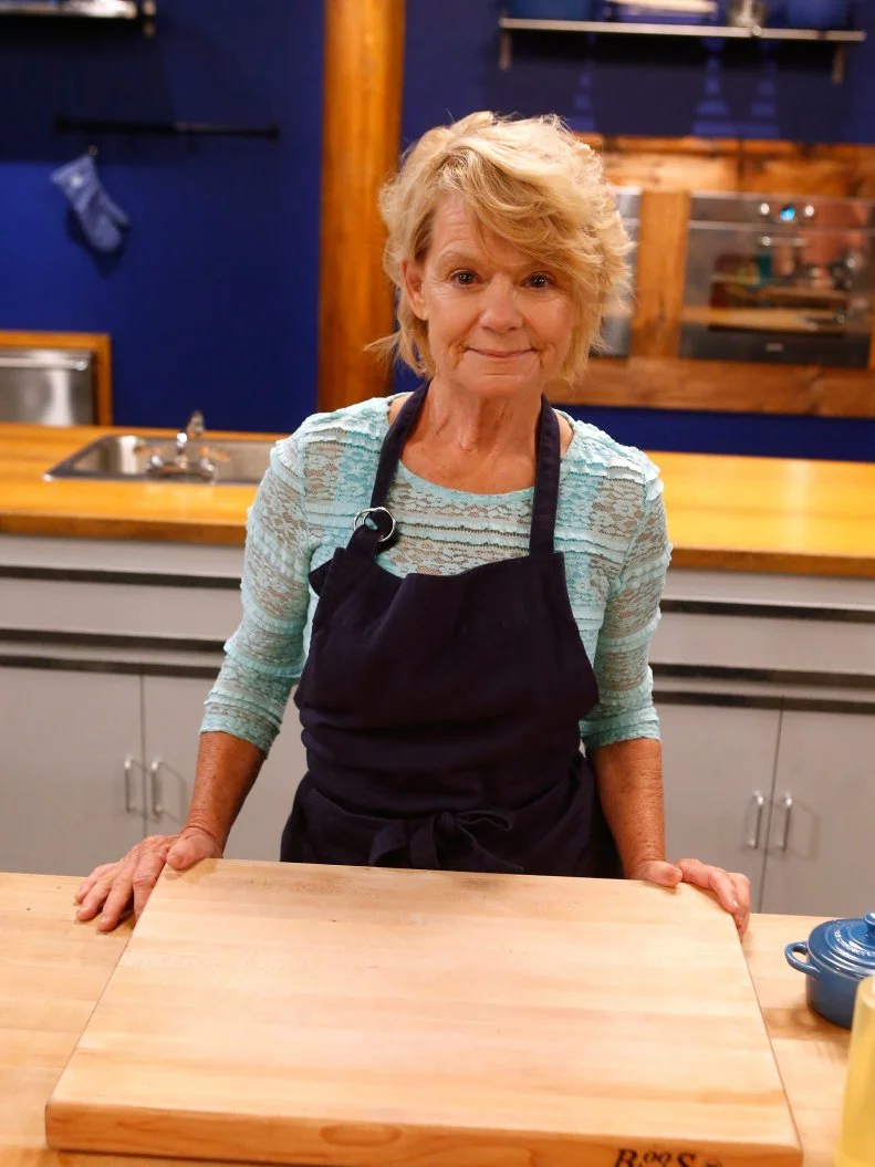 Blue team recruit Holgie Forrester poses on the set of Food Network's Worst Cooks in America, Season 8.