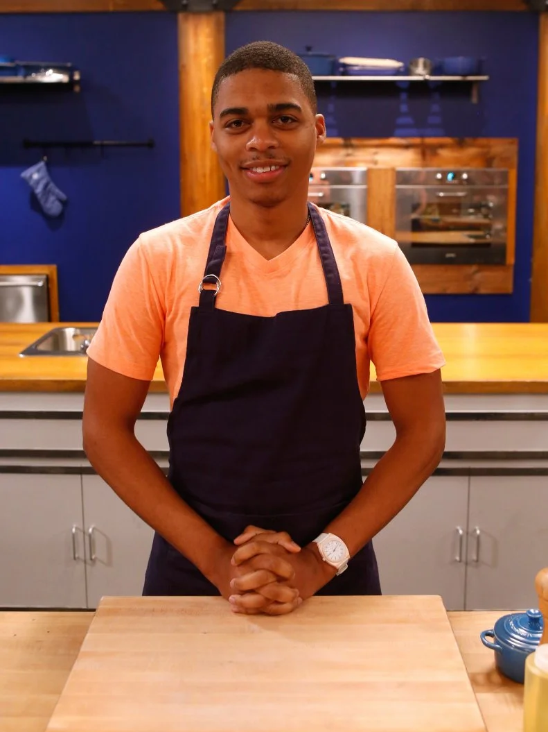 Blue team recruit Lawrence Crawford poses on the set of Food Network's Worst Cooks in America, Season 8.