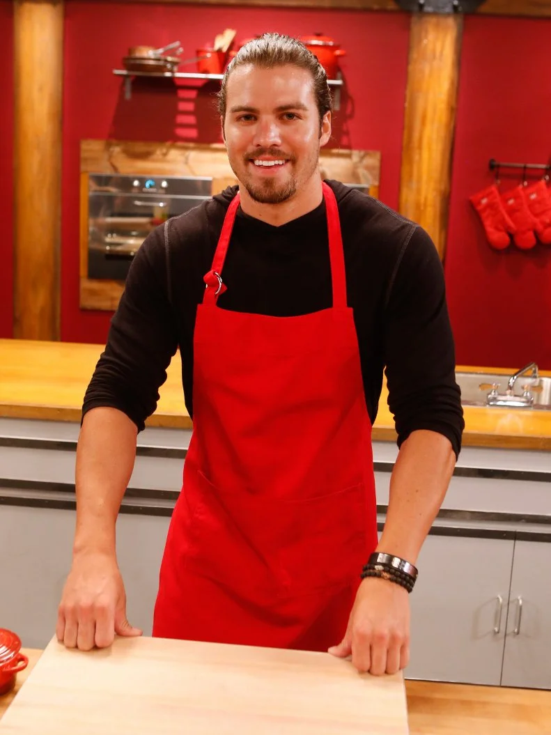 Red team recruit Nick Slater poses on the set of Food Network's Worst Cooks in America, Season 8.