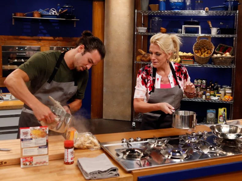 Recruits Nick Slater and Ginny Meerman race to prepare their signature dishes as seen on Food Network's Worst Cooks in America, Season 8.