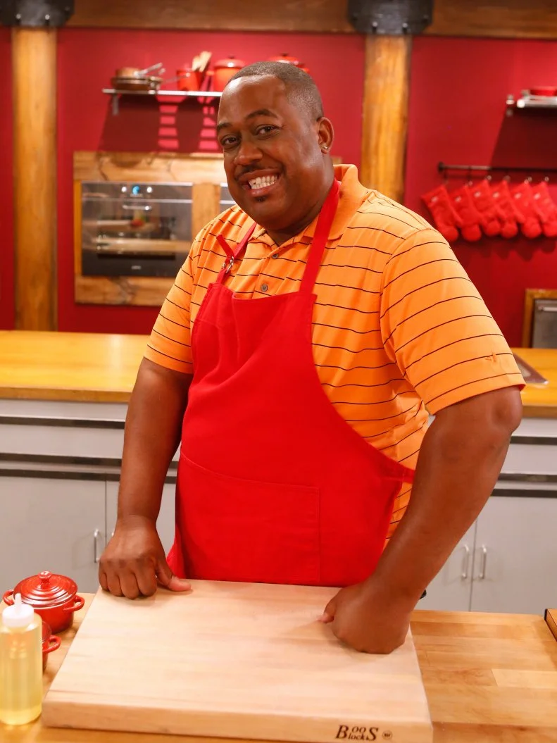 Red team recruit Tyanta Snow poses on the set of Food Network's Worst Cooks in America, Season 8.