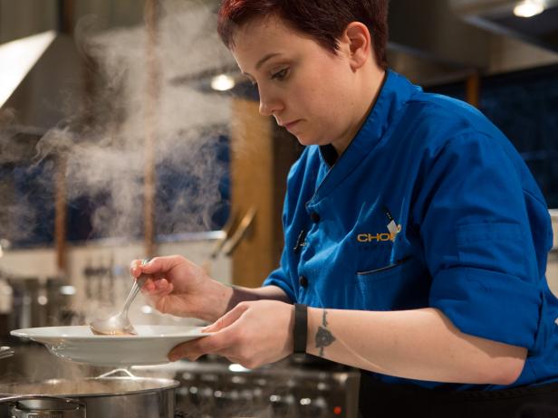 Emily plates her beef dish