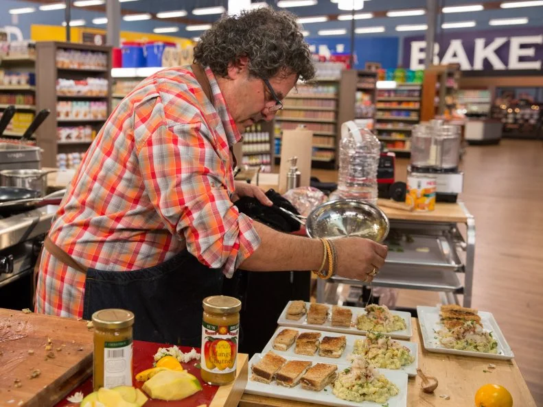 Chef Eddie Matney plates his dish during Game 1, ABC, as seen on Food Network's Guy's Grocery Games, Season 7.