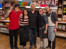 Host Guy Fieri with Tournament of Champions Chefs Veronica Eiken, Jay Kean, Crista Luedtke, and Phillip Franklin Lee, as seen on Food Network's Guy's Grocery Games, Season 7.