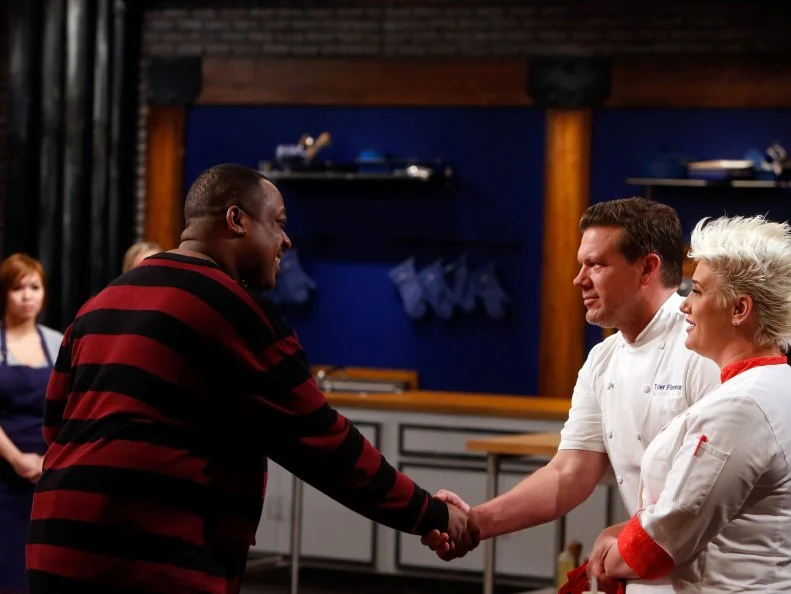 Recruit Tyanta Snow, left, reacts after being named the loser from the red team during elimination as seen on Food Network's Worst Cooks in America, Season 8.