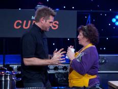 Chef Curtis Stone (L) and Sharon Damante during the mentoring for the first challenge, recipe scramble, as seen on Food Network's All-Star Academy, Season 1.