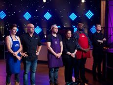 Cook Vanessa Craig (L), Chef Michael Symon, cook August Dannehl, Chef Alex Guarnaschelli, cook Joseph Harris, and Chef Bobby Flay during the judging of the second challenge, burgers and fries, judging, as seen on All-Star Academy, Season 1.