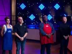 Cook Vanessa Craig (L) with Chef Michael Symon and cook Joseph Harris with Chef Bobby Flay during judging of the final challenge, bass, as seen on All-Star Academy, Season 1.