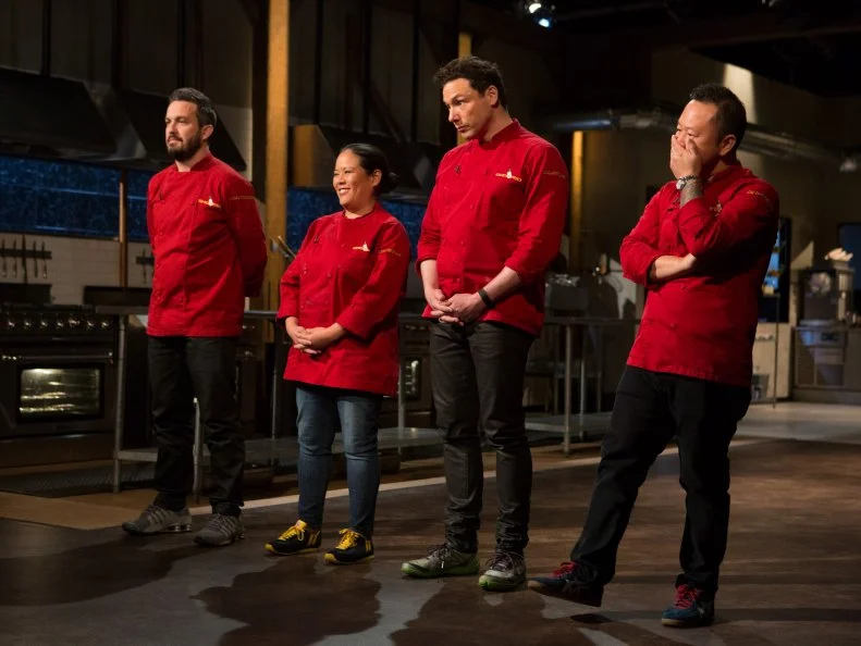 Chefs: Fabio Viviani, Lee Anne Wong, Rocco Dispirito and Jet Tila stand before host Ted Allen and judges: Scott Conant, Amanda Freitag and Aaron Sanchez react to finding out which chefs are moving on to the next round and which chef has been Chopped for Chopped All-Stars $75,000 charity competition, as seen on Food Network's Chopped, Season 24.