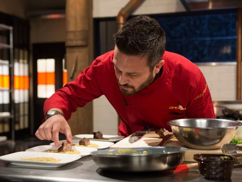 Chef Fabio Viviani works on his entree that must include: chickpea curry, beef shoulder, finger limes and coffee pods for Chopped All-Stars $75,000 charity competition, as seen on Food Network's Chopped, Season 24.