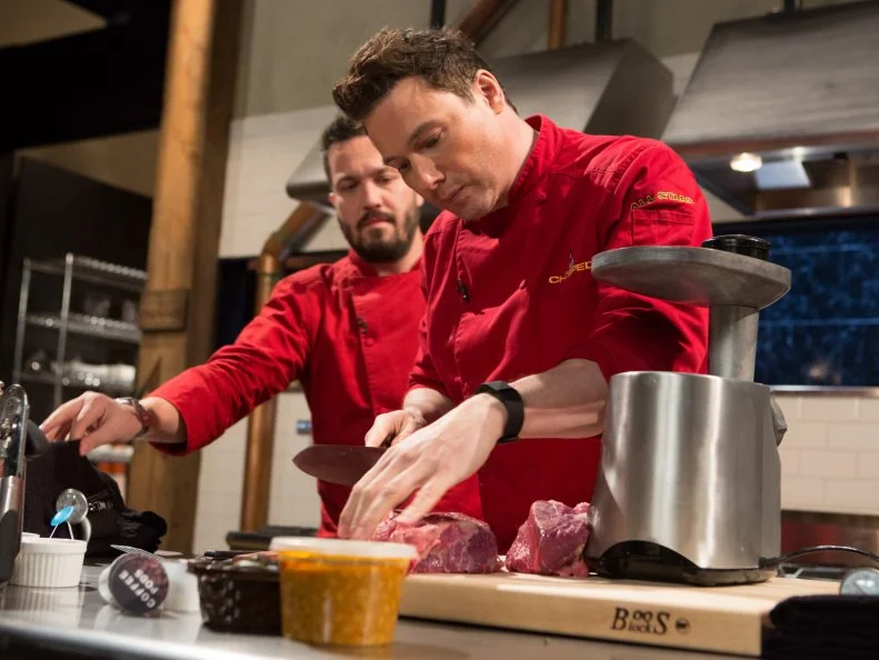 Chefs Fabio Viviani and  Rocco Dispirito work on their entree's that must include: chickpea curry, beef shoulder, finger limes and coffee pods for Chopped All-Stars $75,000 charity competition, as seen on Food Network's Chopped, Season 24.