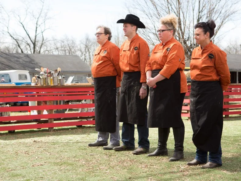 Chefs: Chris Hart, Randy Pauly, Danielle Dimovski and Staci Graves Jett stand before Chopped host Ted Allen and judges: Scott Conant, Amy Mills and Chris Santos moments before finding out which chefs will move on to cook in the next round and which chef has been Chopped, as seen on Food Network's Chopped, Grill Masters Special.