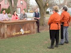 Chefs Chris Hart and Danielle Dimovski stand before Chopped host Ted Allen and judges: Scott Conant, Amy Mills and Chris Santos moments before finding out which chef has been chopped and which chef is a chopped champion and has won a spot in the $50,000 finale, as seen on Food Network's Chopped, Grill Masters Special.