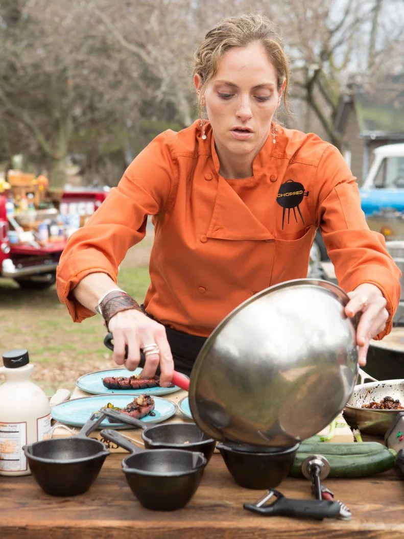 Chef Mary Brent Gaylean works on her appetizer that must include: raw hamburger, salsa con queso, zucchini and hotdogs, as seen on Food Network's Chopped, Grill Masters Special.