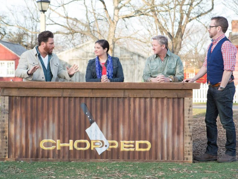 Chopped host Ted Allen and judges: Scott Conant, Alex Guarnaschelli and Tim Love discuss the chefs cooking, as seen on Food Network's Chopped, Grill Masters Special.