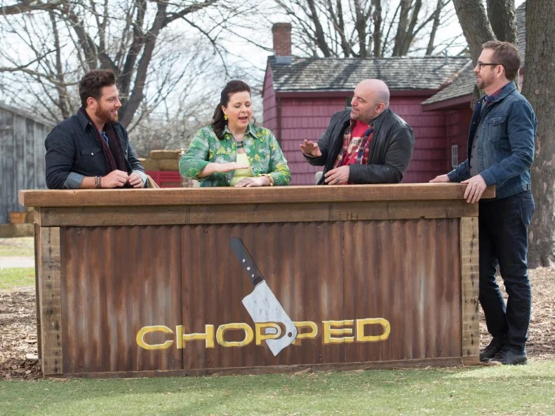 Chopped host Ted Allen and judges: Scott Conant, Amy Mills and Chris Santos discuss the chefs dishes, as seen on Food Network's Chopped, Grill Masters Special.
