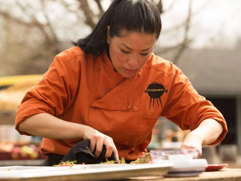 Chef Angie Mar works on her dessert that must include: dragon fruit, pancakes, lemon meringue pie and jalapeÃ±os, as seen on Food Network's Chopped, Grill Masters Special.