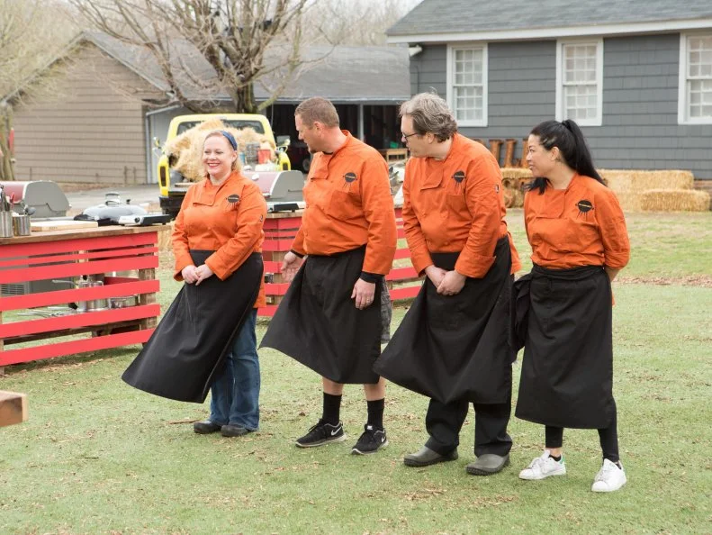 Chefs: Leslie Roark Scott, Stan Hays, Chris Hart and Angie Mar stand before Chopped host Ted Allen and judges: Scott Conant, Alex Guarnaschelli and Chris Santos moments after finding out which chefs will move to cook in the next round and which chef has been Chopped, as seen on Food Network's Chopped, Grill Masters Special.
