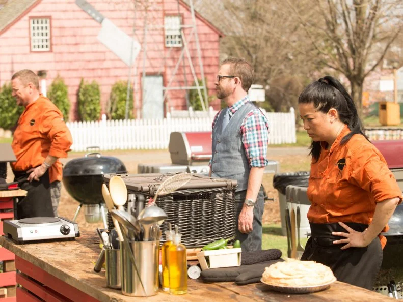 Chef Stan Hays and Angie Mar with Chopped host Ted Allen before they compete in the dessert round for the $50,000 prize,  as seen on Food Network's Chopped, Grill Masters Special.