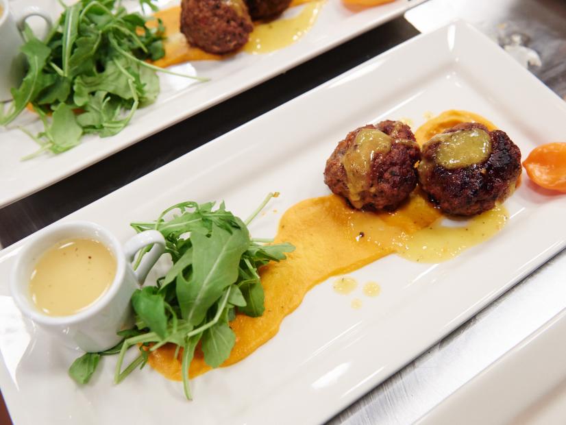 Finalist Eddie Jackson's dish, Caribbean Spiced Meatball with Carrot and Ginger Puree, for the Cook For Your Life challenge, as seen on Food Network Star, Season 11.
