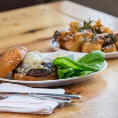 A Hamburger and the JW Potatoes are on display here, as seen on Food Networkâ  s Burgers, Brew and 'Que, Season 1.